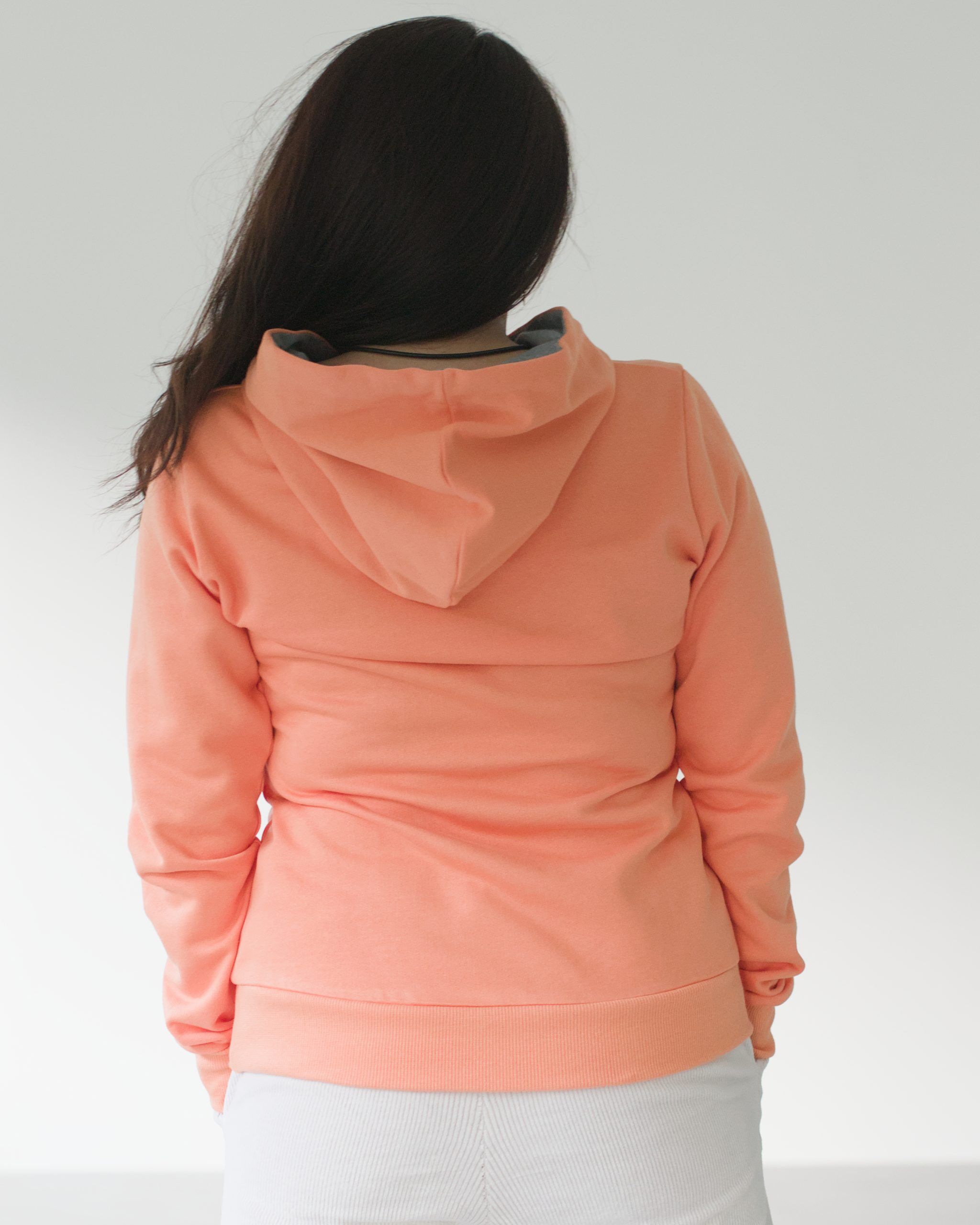 hoodie_mRV_bio_fair_frau_papaya_rueck